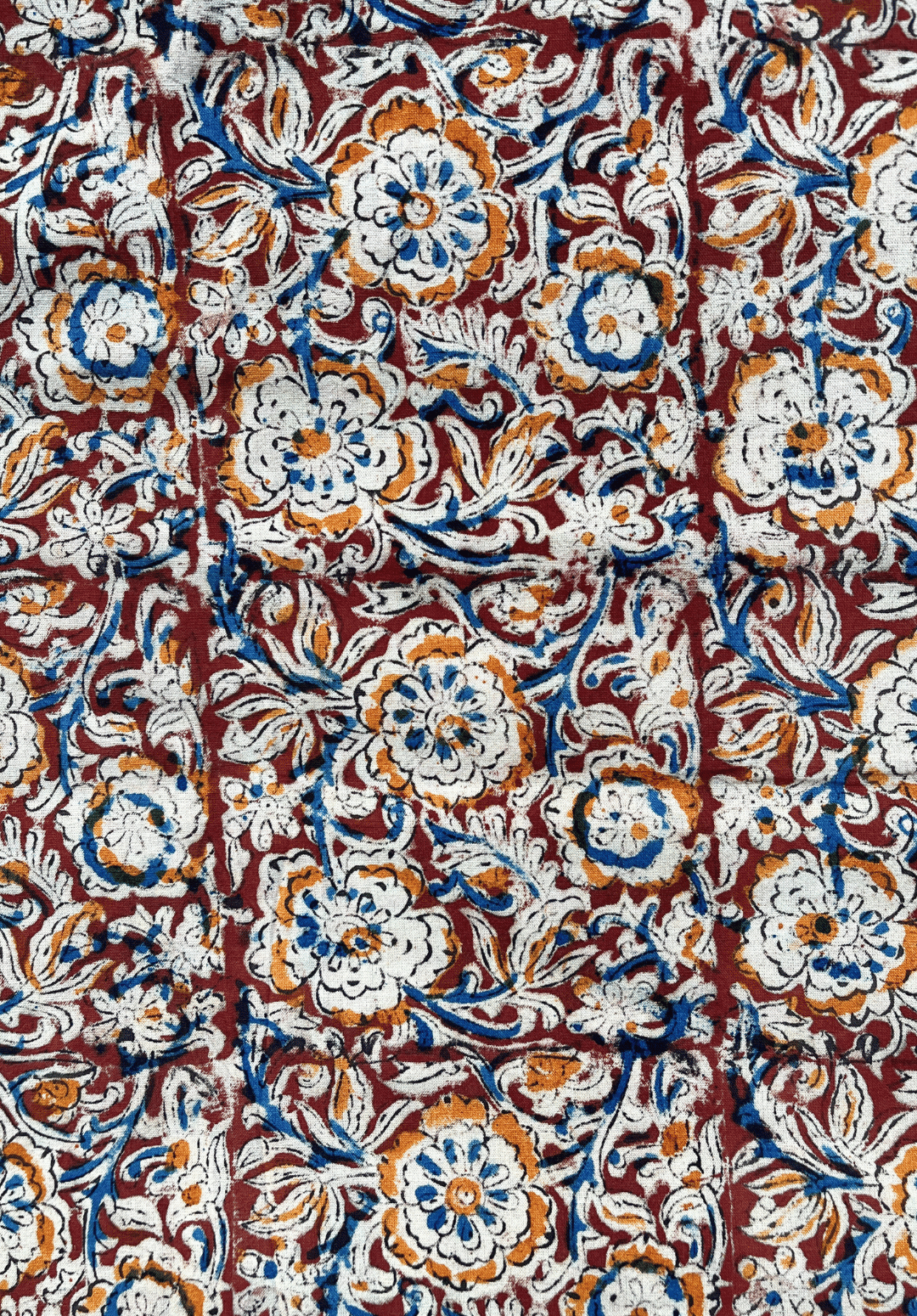 Floral Kalamkari on Maroon Fabric with Blue and Mustard Accents