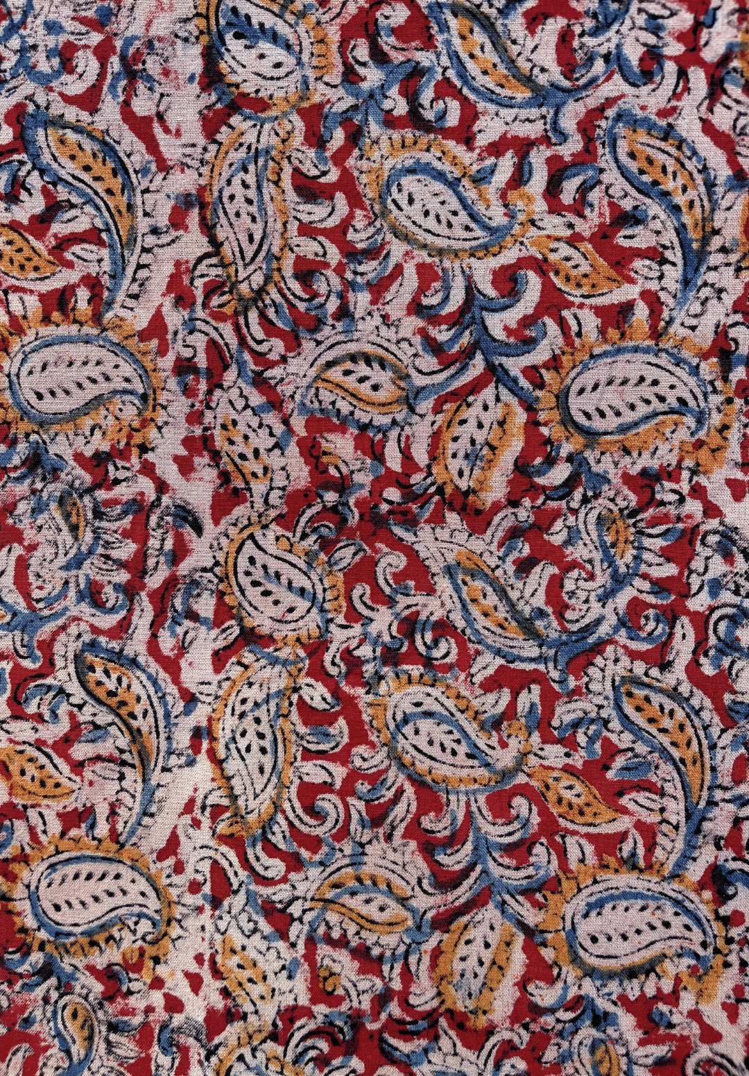 Paisley Kalamkari Print on Red Fabric with Blue and Mustard Accents