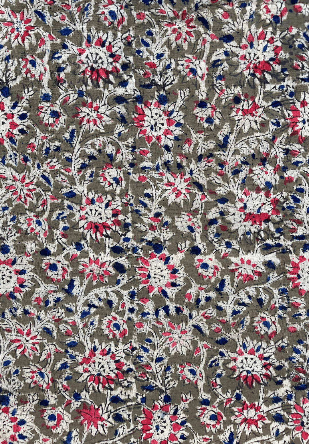 Traditional Kalamkari Fabric with Floral Motifs on Green Background