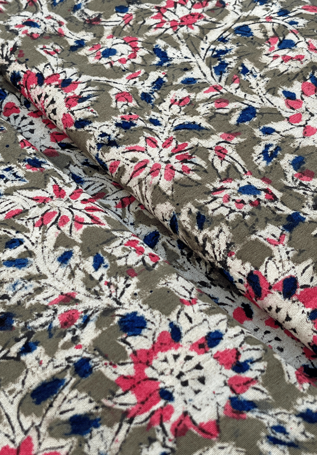 Traditional Kalamkari Fabric with Floral Motifs on Green Background