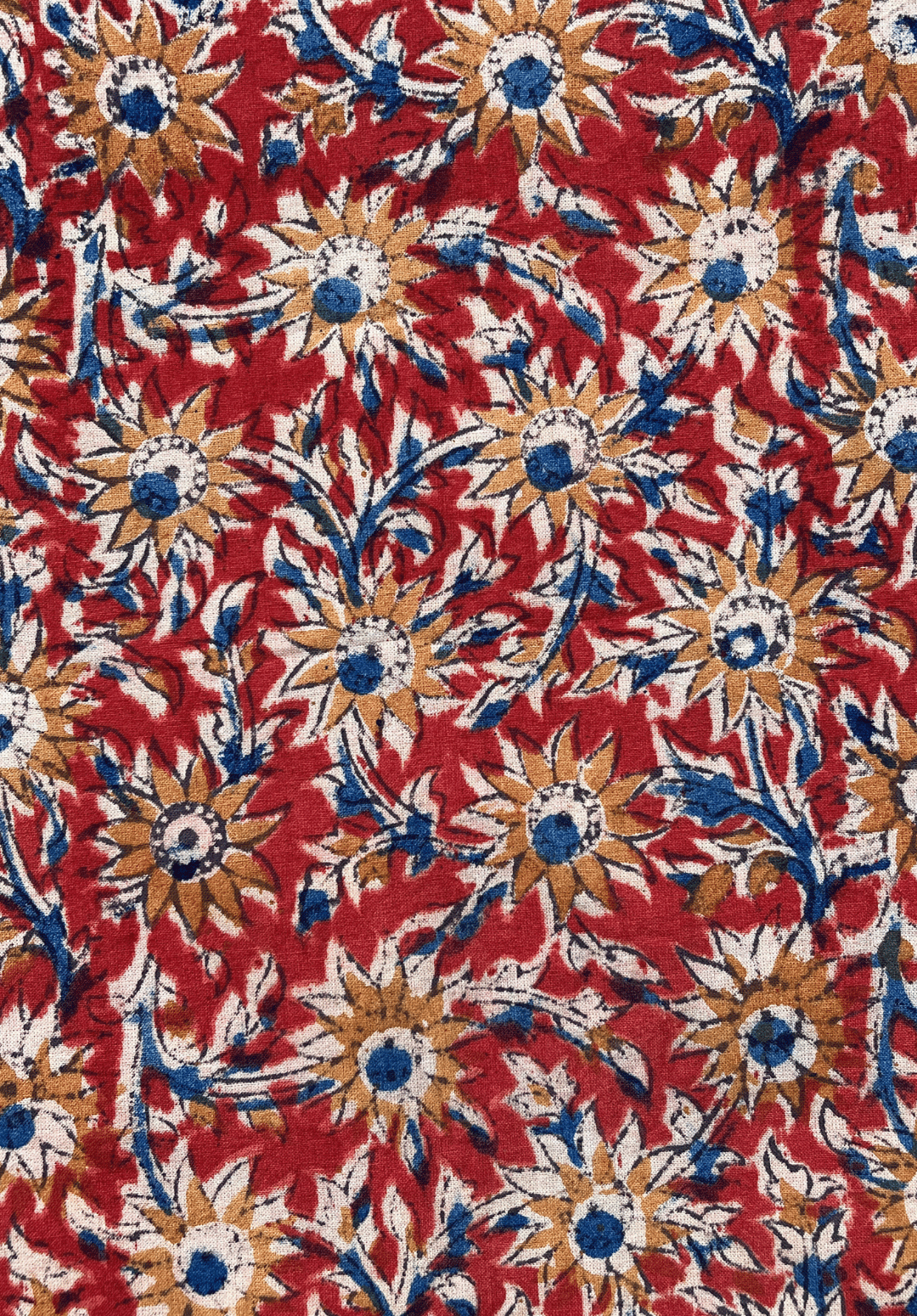 Kalamkari Fabric with Sunflower Motifs on a Rich Red Background