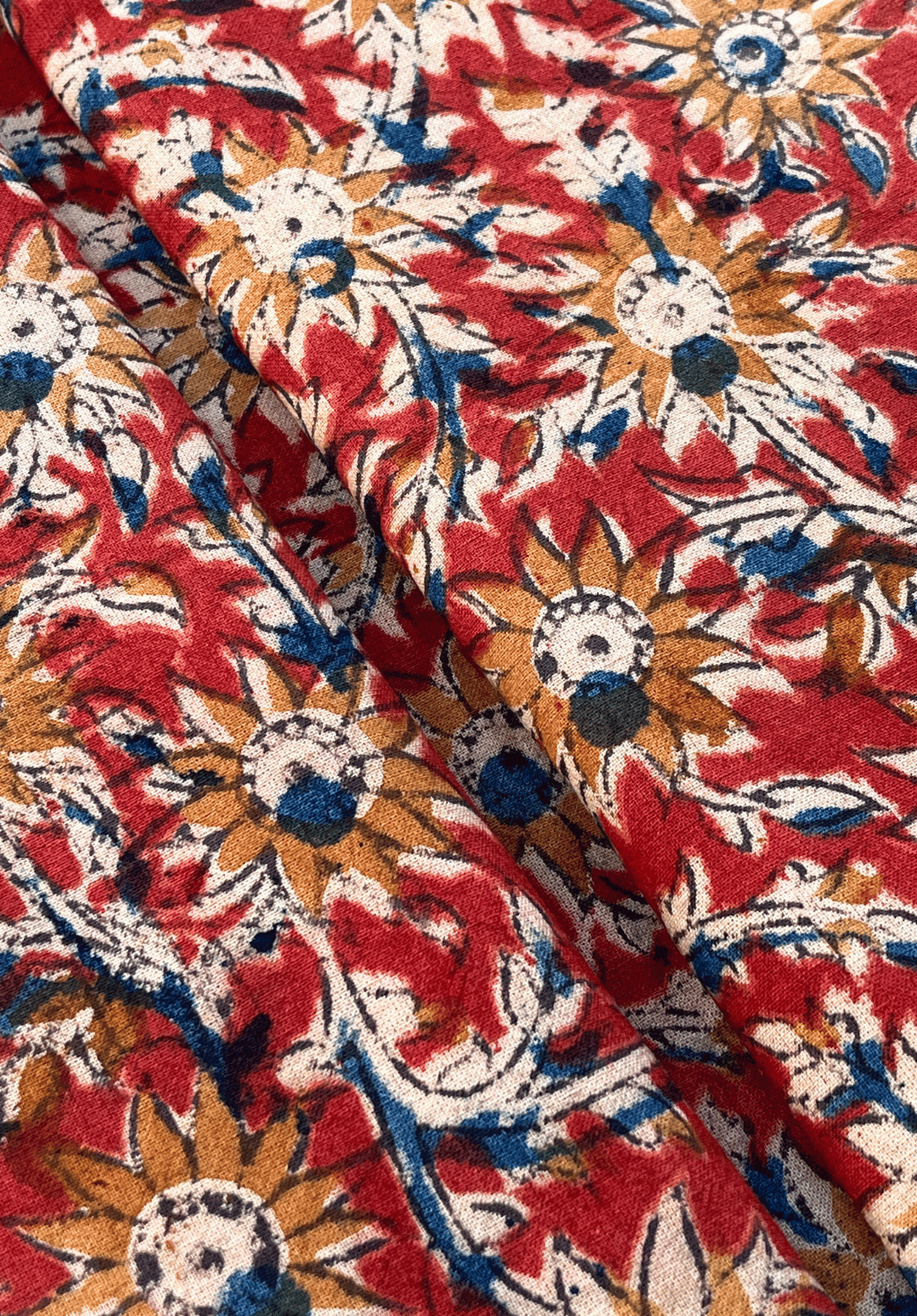 Kalamkari Fabric with Sunflower Motifs on a Rich Red Background